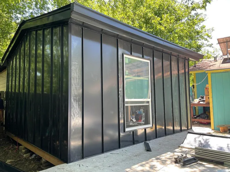 Black standing seam metal wall panels for Roof Inspection in McMinnville