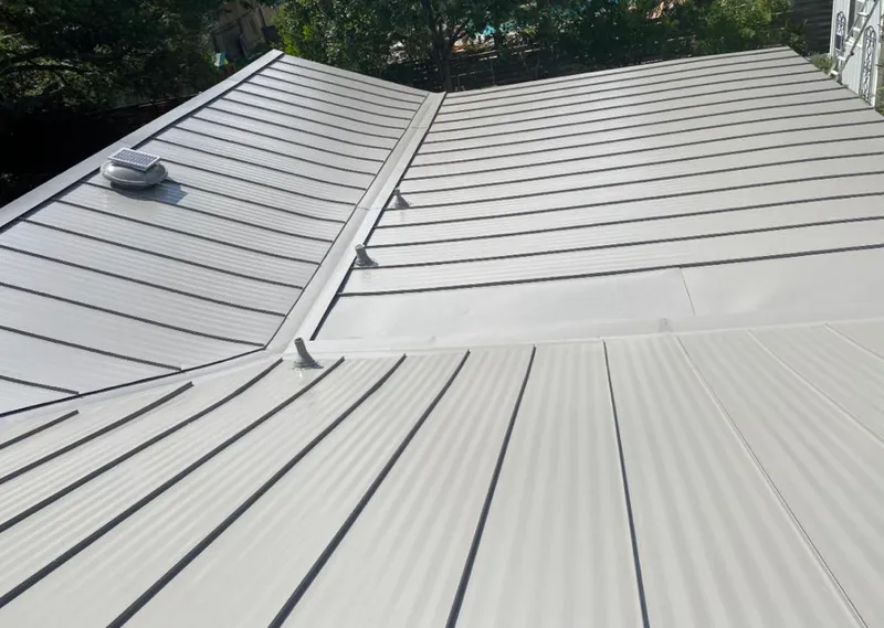 Solar attic fan installed on a metal roof for Roof Ventilation in McMinnville